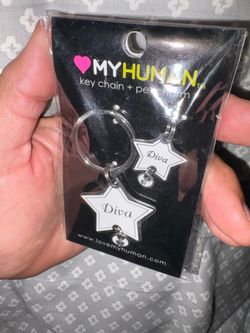 New. Keychain with matching charm for pet collar