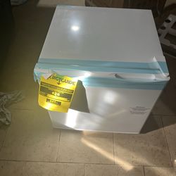 White mini fridge