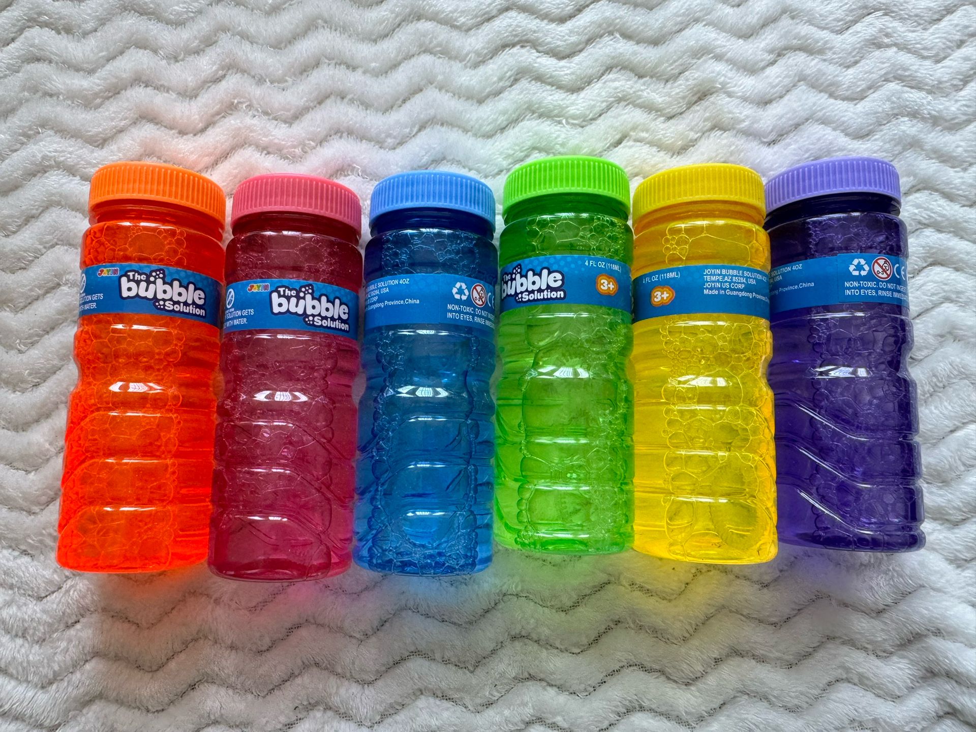 Box of 32 bubbles in various colored bottles