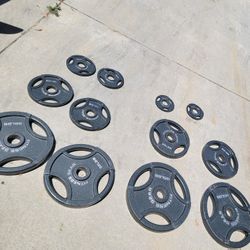 Lots Of Olympic Weights Available. 45s, 35s, 25s, 10s, 5s. $1 a pound  Very nice dumbbells A Couple Of  40 Lbs And 7 Ft Olympic Bars