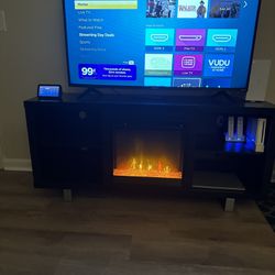 Black TV Stand With Fire Place Heater 