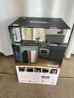 New in a box Kohler 47L Step Trash Can. never used. Just opened to show. See photos