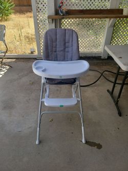 Grey baby toddler high chair used good condition besides some stains