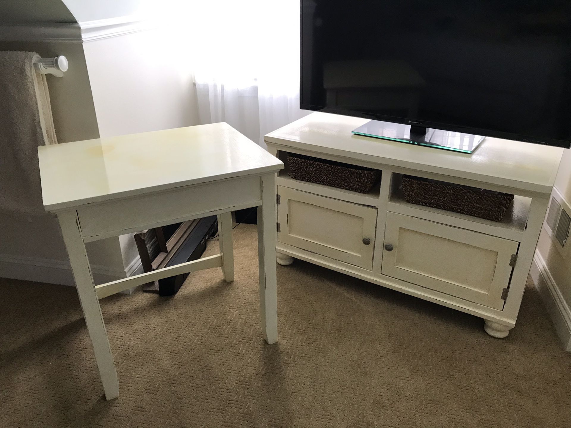 TV stand and end table. White distressed look. Very cute storage. End table is a little higher than a normal end table but is more level with a couch
