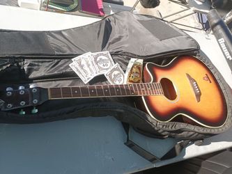 6 string acoustic guitar and travel case