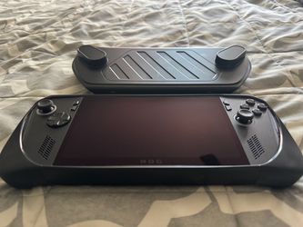 ASUS ROG Ally X with accessories.
