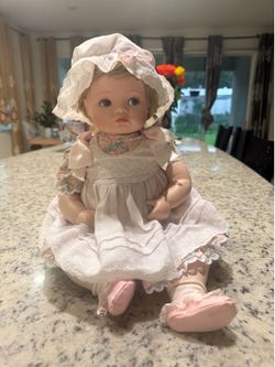 The Hamilton collection  porcelain doll multi color