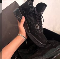 Jordan 4 black trainers. Size US 6.5 used.