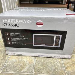 1000 watt Farberware stainless Microwave