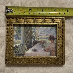 "On the Porch" by American Impressionist artist William Chadwick (1879–1962).