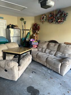 Tan Microfiber living room set with coffee tables