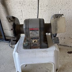 Bench grinder with attached light