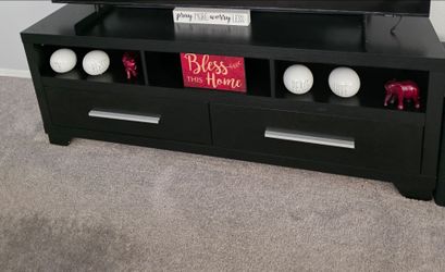 Black TV Stand with Drawers,couch ,coffee table and dining set.and all the decorations