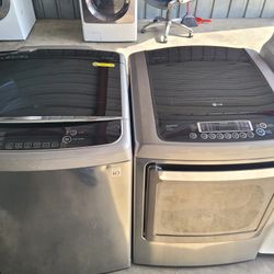 LG MEGA CAPACITY 5.8cu FT Top Load Washer And Gas Dryer Set 