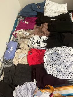 Lot of women’s clothing different sizes, some with tags
