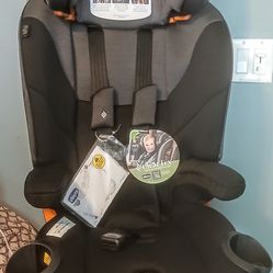 NEW WITH TAGS!  CHICCO HARNESS AND BOOSTER SEAT