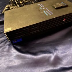 Playstation 2 with memory card and controller