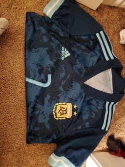12 Argentina jerseys and shorts