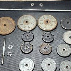 Barbell + 225 Lbs Of Weights + 2 Loadable Dumbell Handles And 3 Pairs Of Spin Collars