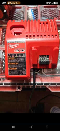 Milwaukee M12 and M18 multi-voltage battery charger, model number 48-59-1812.