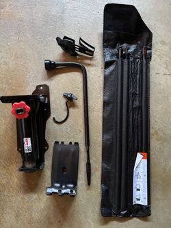 Chevy spare tire access tool and jack