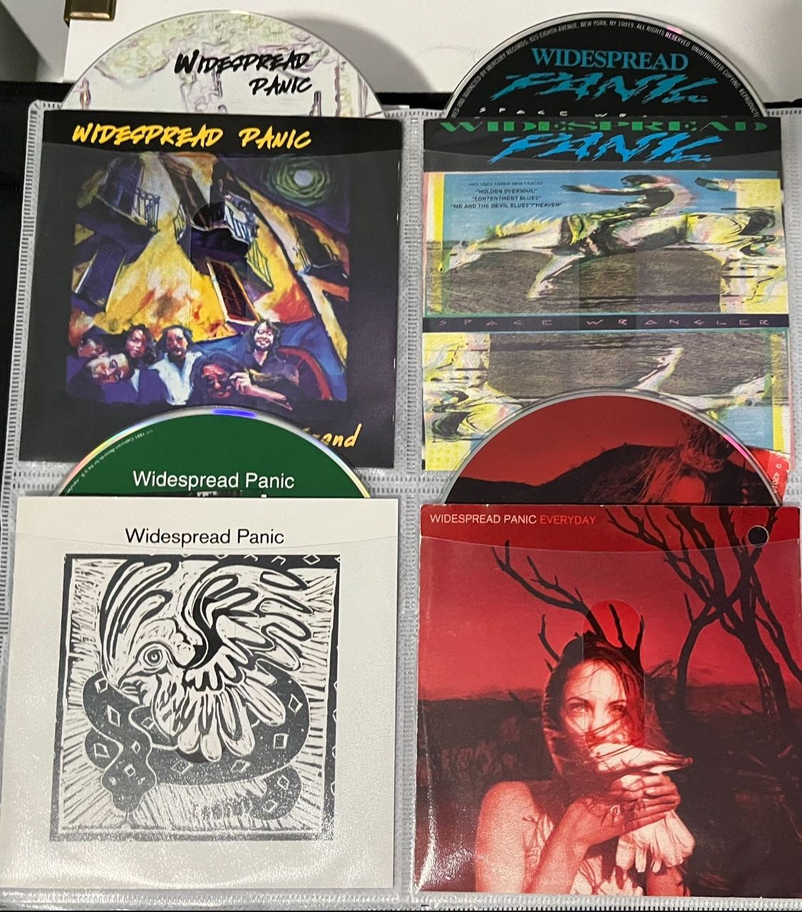 Widespread Panic Collection 4 CDs Great collection of songs. Includes 4 CDs and album notes and art. No plastic gem boxes. In CD sleeve. I can mix an