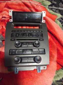 OEM radio and climate control panel for mustang
