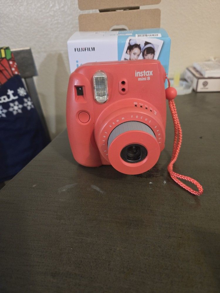 Gently Used INSTAX MINI 8. IN raspberry Orange