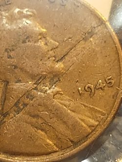 Coin..1945..P.. Lincoln Cent.. Error..( Laminated )