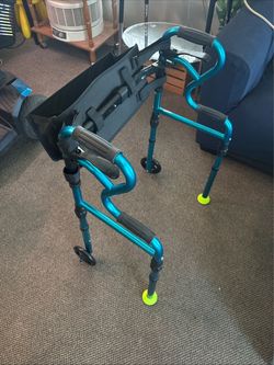 Folding adjustable walker