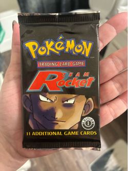 Sealed first edition team rocket pack