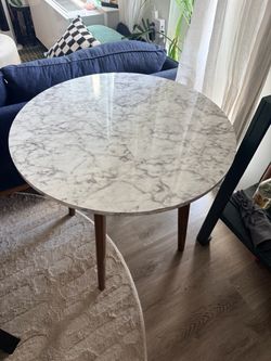 Round Faux Marble Top Dining Table with Tapered Wood Legs