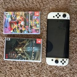 Nintendo Switch OLED With 2 Games