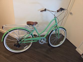 A Mint Green EVRYjourney Steel Bike