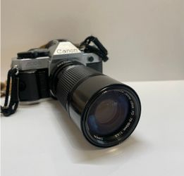 Canon AE-1 vintage 35mm film camera w/ 75-150mm FD lens