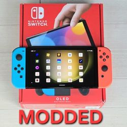 Nintendo Switch OLED With 200 Games + 10000 Retros + Movies 