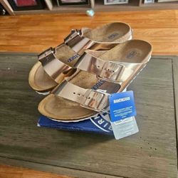 Step in Comfort with Authentic Birkenstock Slides! near ahead