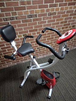 FOLD UP EXERCISE BIKE THAT ADJUSTS TO DIFFERENT HEIGHTS SEAT GOES UP & DOWN/ $40.00 FIRM