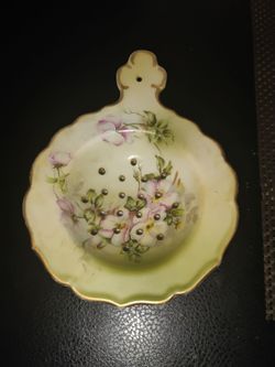 Nippon tea bag strainer with  drip bowl