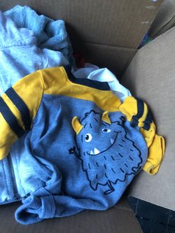 Lots of baby boy clothes