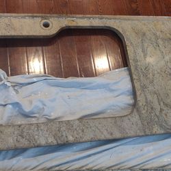 Granite countertop with kitchen sink cutout