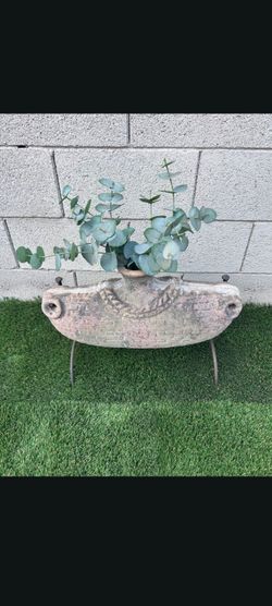 Vintage boat ship planter with wrought iron stand