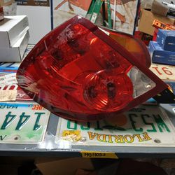 03-07 Saturn Ion Coupe Tail Light Left Driver Side Oem