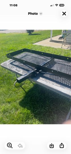 5 feet by 19 inches. Tow hitch storage rack