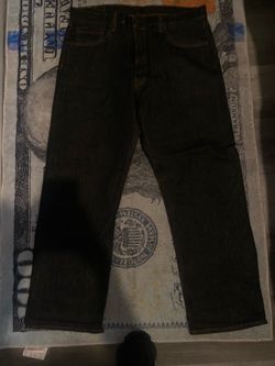 Charcoal 501s and dark blue 501s sold separately