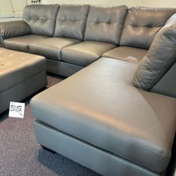 Ashley Donlen L Shape Leather Gray Sectional Couch With Chaise| Brand New| Sleeper Optional Available| Ottoman Available Sold Separately| Color Option
