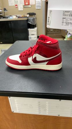 Red and white Nikes