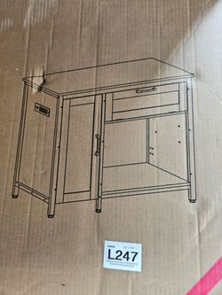 Bestier 40-50 Gallon Aquarium and Reptile Terrarium Stand (Mode, which features a black wood grain finish, gold handles, an integrated charging statio