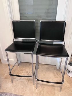 2 Italian leather and chrome bar stools