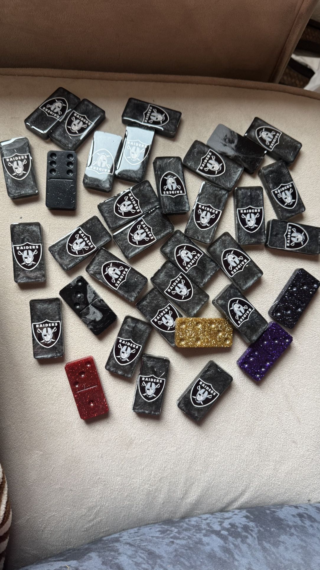 RAIDERS Domino’s, and a couple of other colors that are glittered 